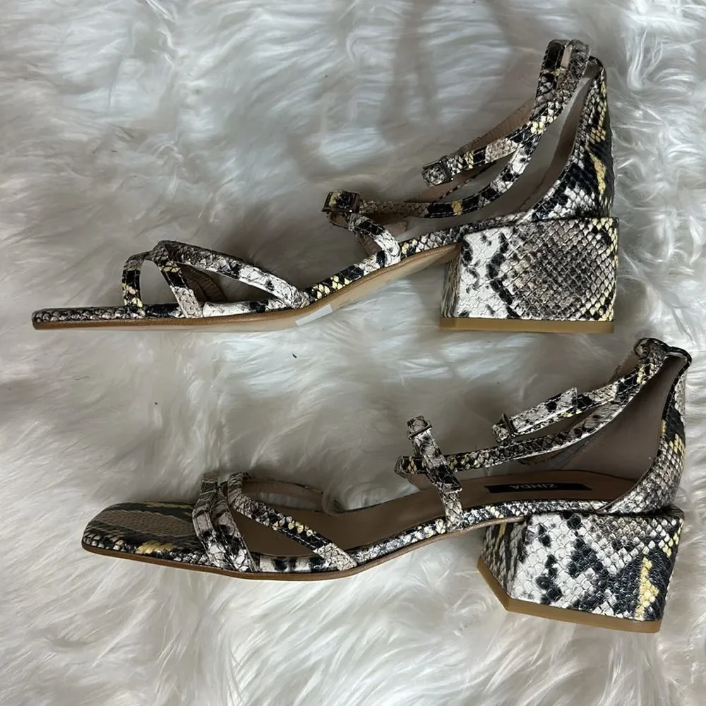 Unworn snake print wedges